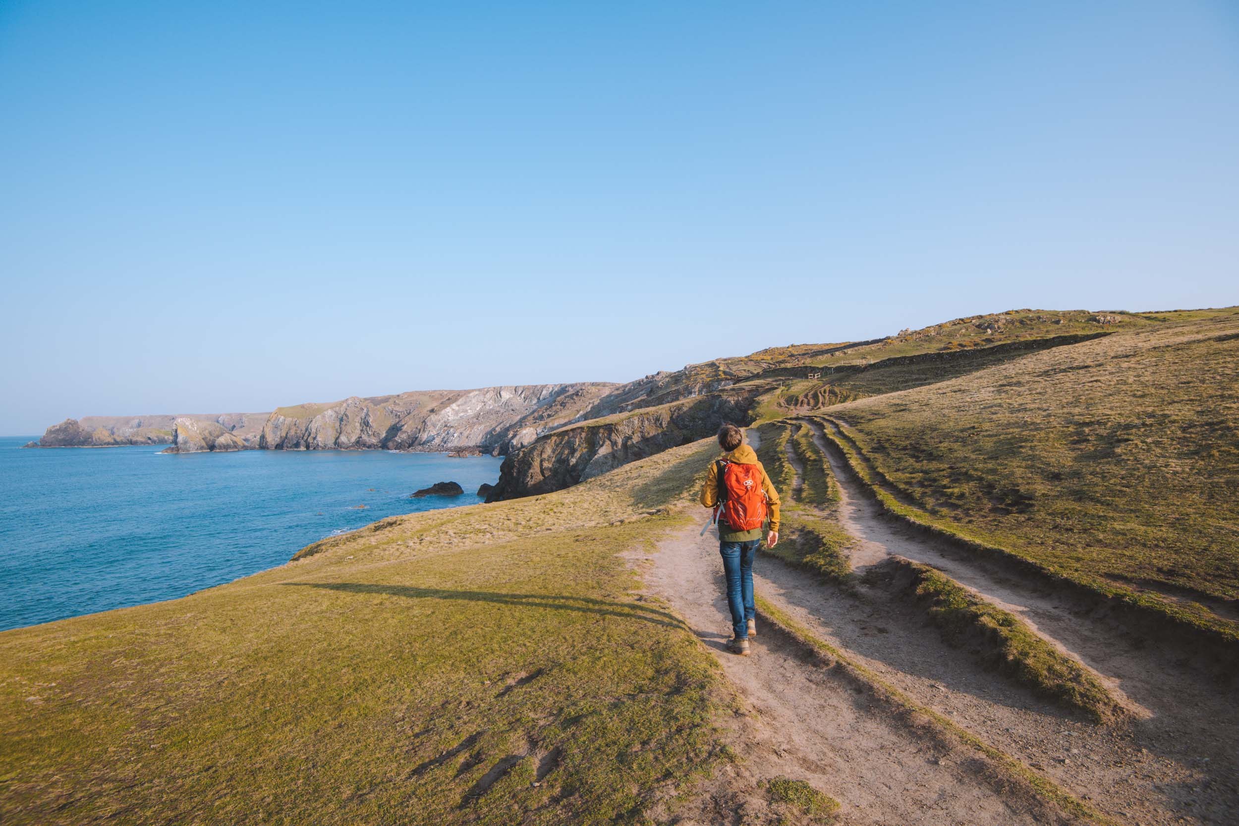 florian walking along the cliffs of the south west coast path in cornwall